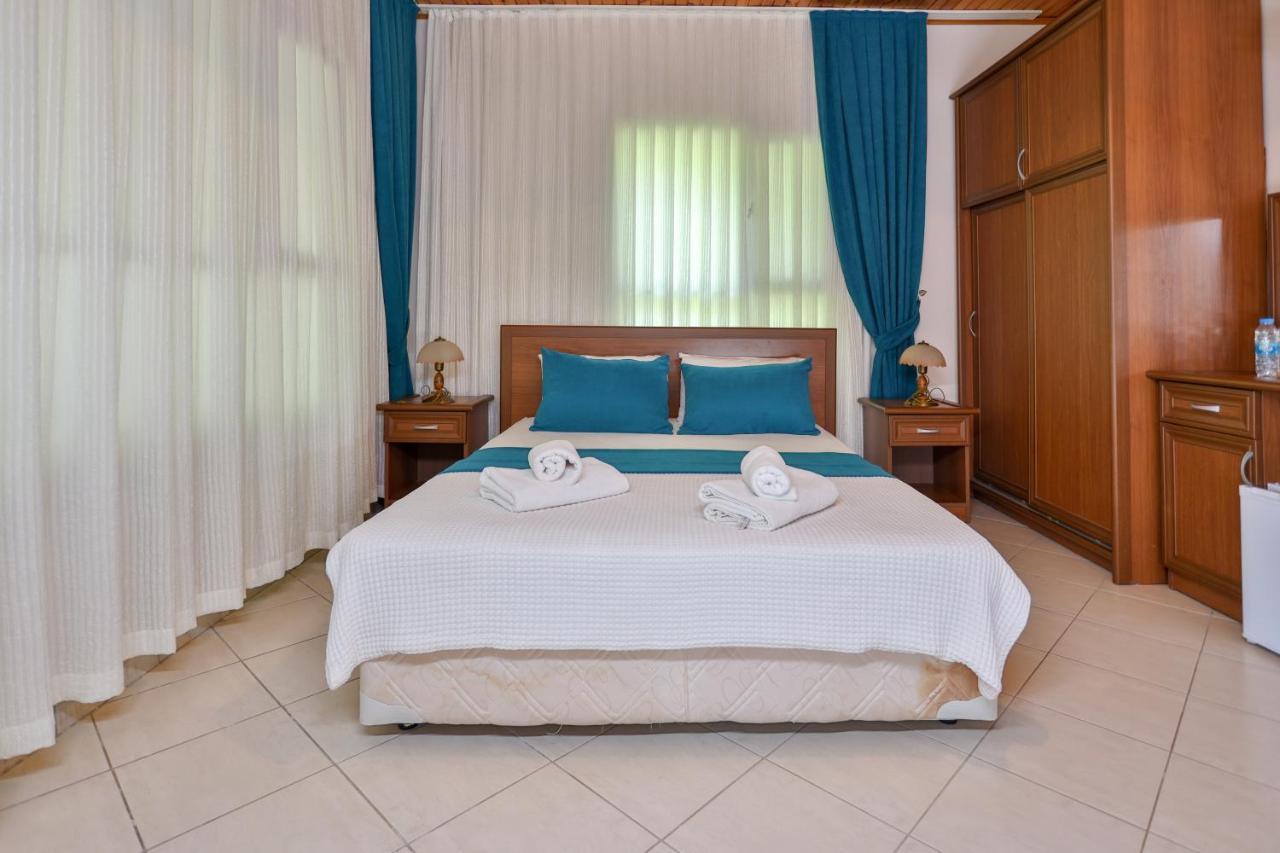 Dolunay Apart Hotel Чирали Экстерьер фото